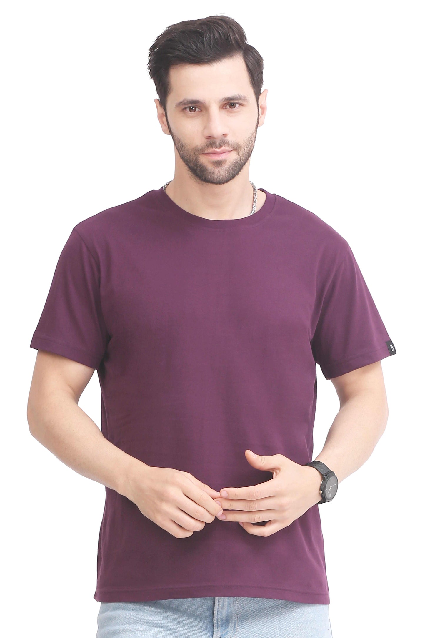 Men's regular cotton t-shirt in purple with crew neck and short sleeves worn by a man
