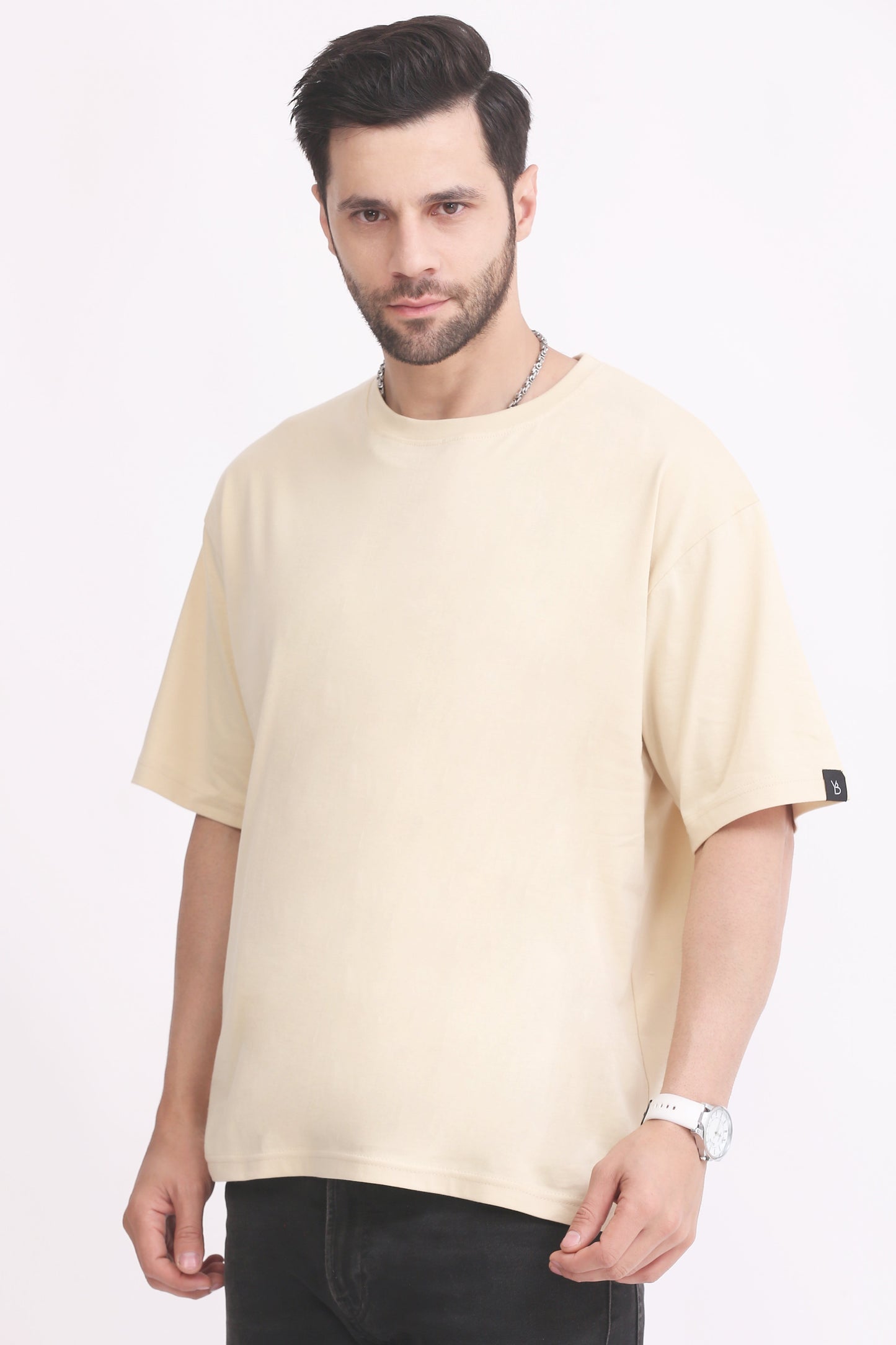 Beige oversized round neck mens T shirt made from premium cotton with half sleeves and regular fit.