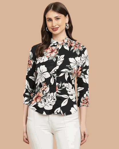 Women's black rayon viscose shirt with pink and white floral print and 3/4 sleeves worn by a woman